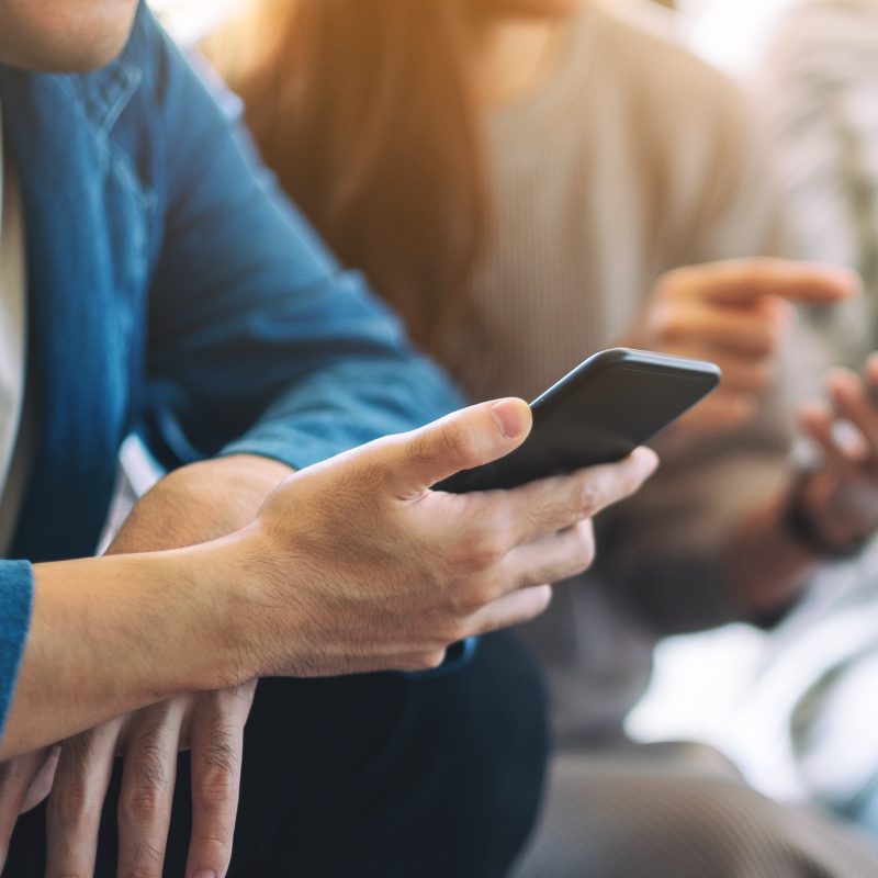 Closeup of hands holding a smartphone